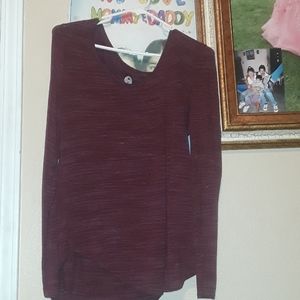 Red long-sleeved v neck shirt